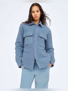 TNA Polar Fleece Shirt Jacket from Aritzia in a soft granite blue hue.